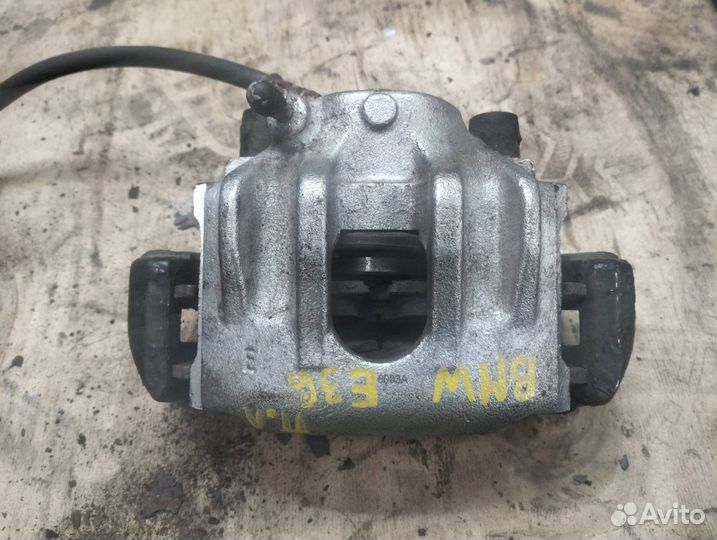 Суппорт тормозной передний левый BMW 3 E36