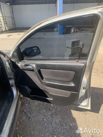 Дверные карты Opel Astra G
