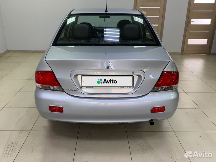 Mitsubishi Lancer 1.6 AT, 2009, 140 650 км