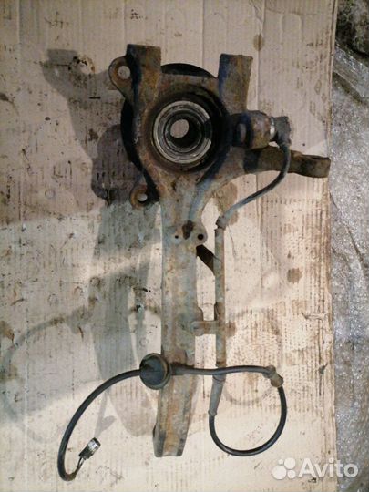 Кулак поворотный передний левый Kia Magentis