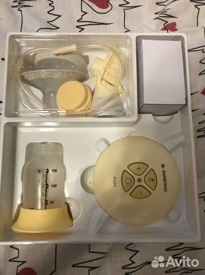 Молокоотсос medela электрический