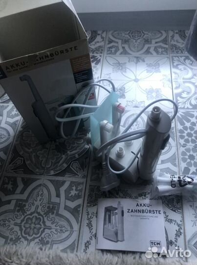 Электронная зубная щетка