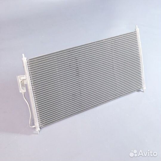 Радиатор кондиционера Ниссан Альмера В10 06-12