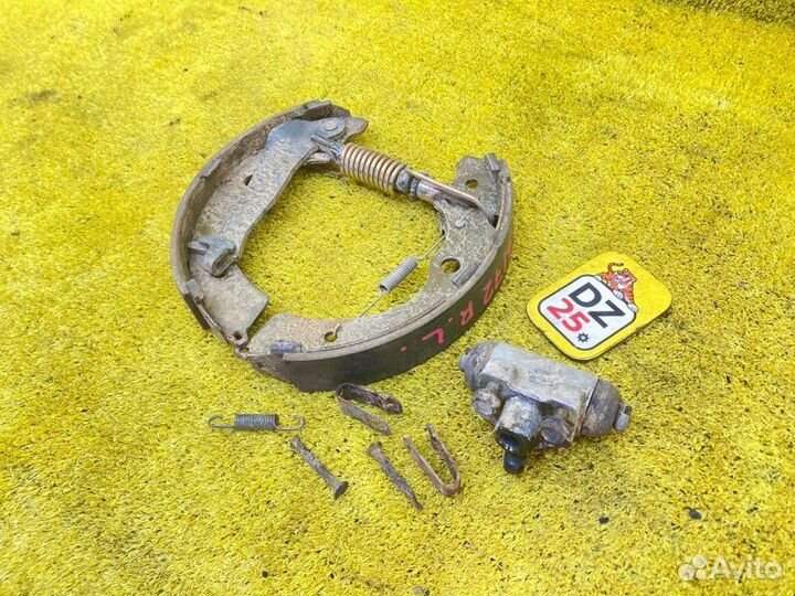 Механизм стояночного тормоза задний левый Suzuki 145086