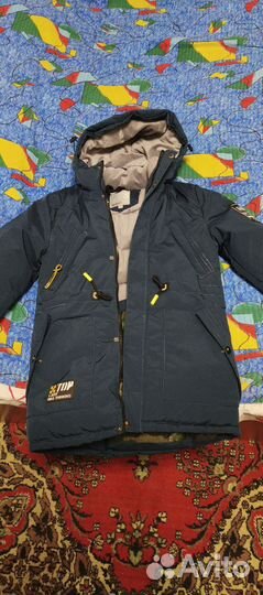 Продам куртку зимнюю на мальчика