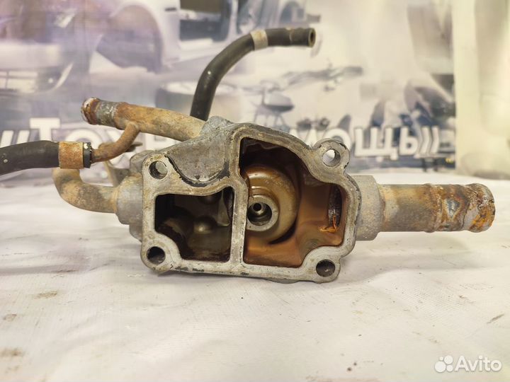 Корпус термостата Nissan Almera N16