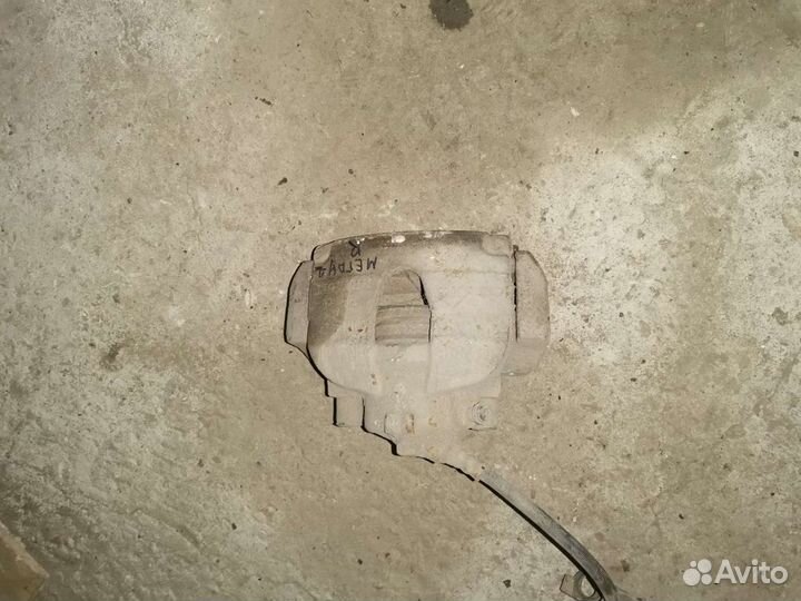 Супорт передний правый рено меган 2