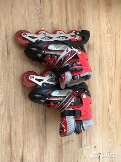 Роликовые коньки