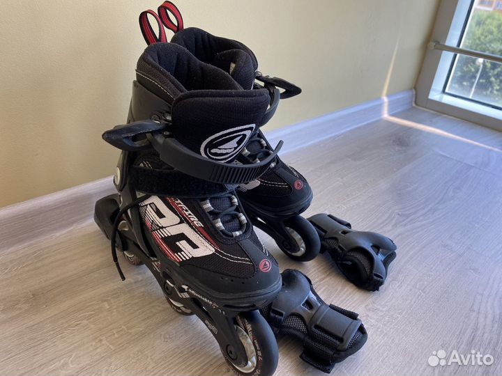 Роликовые коньки