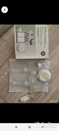 Молокоотсос электрический новый