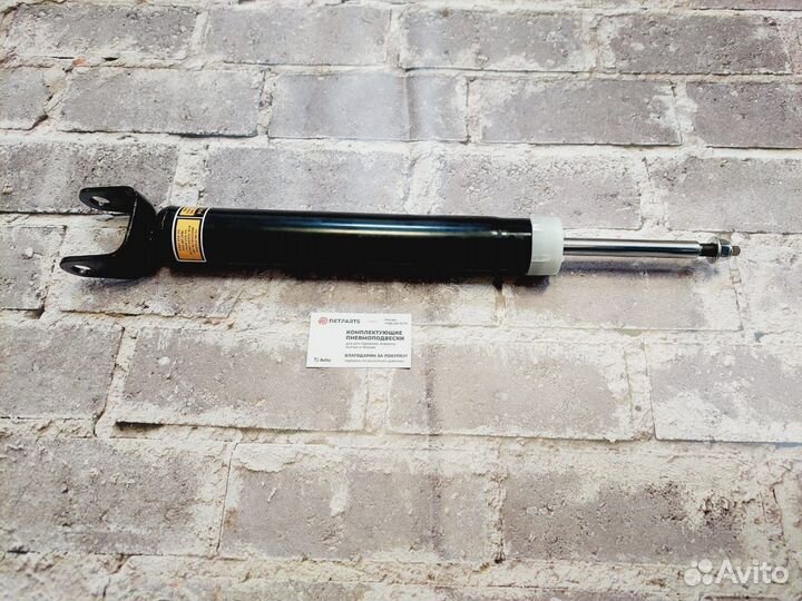 Grand cherokee амортизатор задний