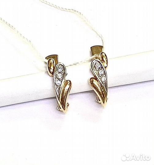 Золотые серьги с камнем