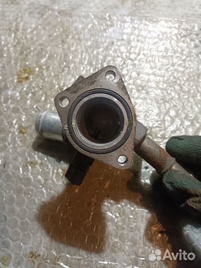 Тройник охлаждения (фланец) 1.6 G4FG Hyundai Kia