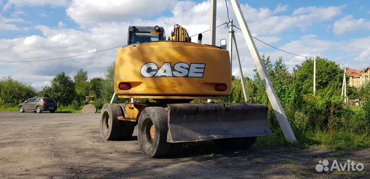 Колёсный экскаватор CASE WX145, 2004