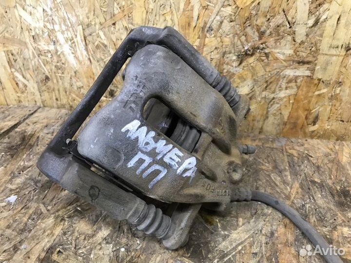 Суппорт передний правый Альмера Логан Ларгус К4М