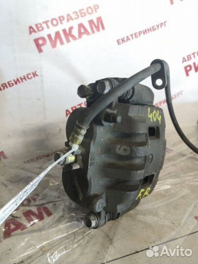 Суппорт тормозной передний правый Subaru Forester