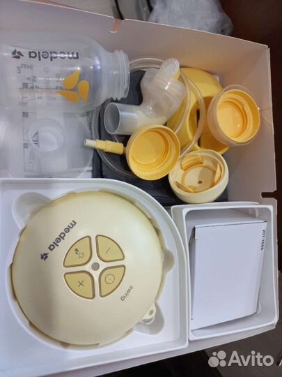 Молокоотсос medela электрический