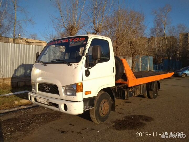 Услуги эвакуатора.Перевозка автомобилей