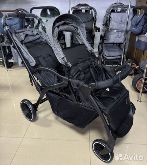Новая прогулочная коляска для двойни