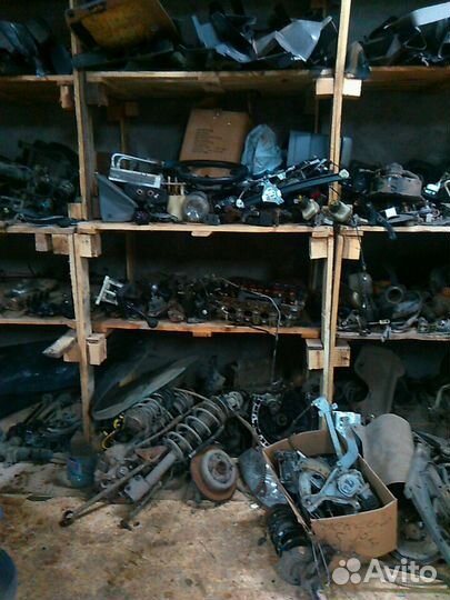 Суппорт задний левый Шевролет Лачетти