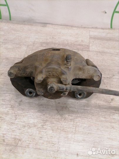 Суппорт передний правый Mitsubishi Lancer 9 CS5W