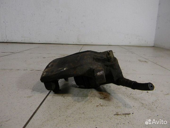 Суппорт передний левый