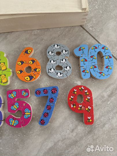 Детская мгра развивающая пазлы цифры elc