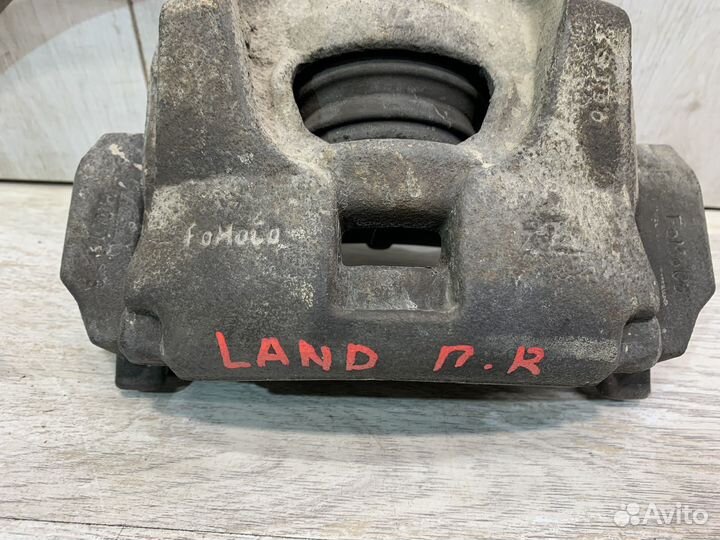 Суппорт тормозной передний правый Land Rover Freel