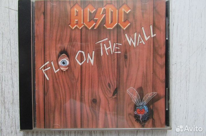 CD AC DC FLY ON THE wall