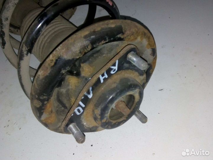 Амортизатор передний правый Митцубиси Ланцер 10