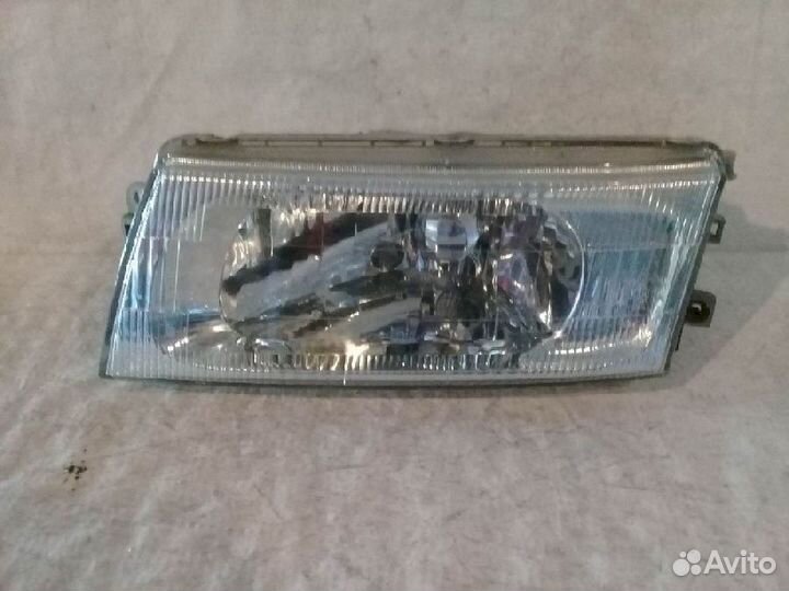 Фара левая 7552 Mitsubishi Lancer CK1A