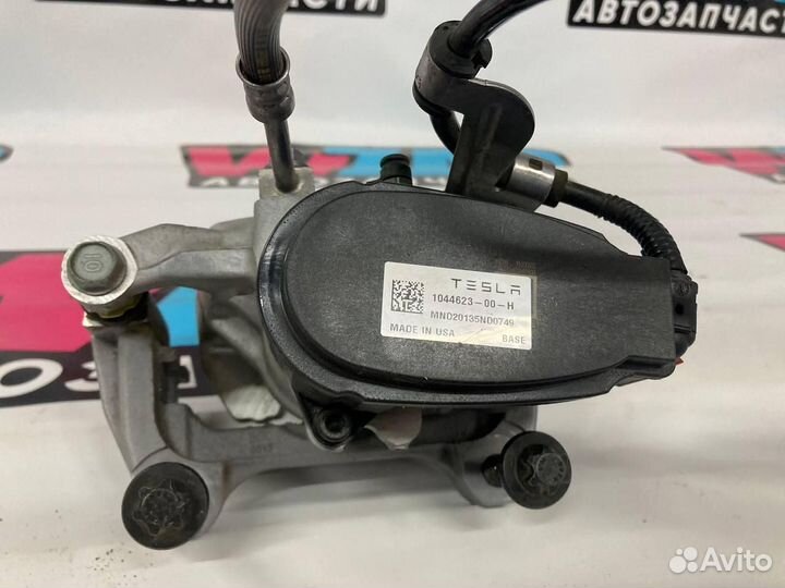 Суппорт тормозной задний левый Tesla Model 3