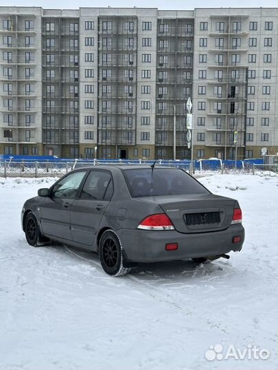 Mitsubishi Lancer 1.6 AT, 2005, 238 400 км