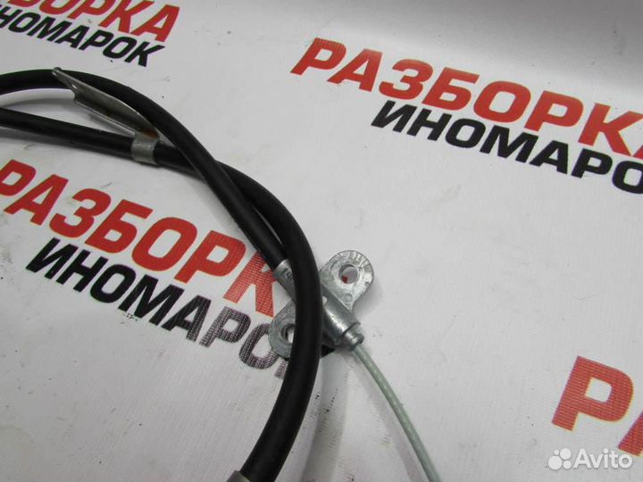 Трос стояночного тормоза центральный для Nissan Mu