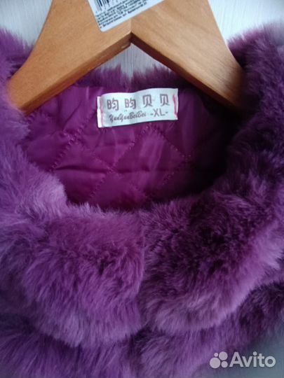 Жилетка меховая женская