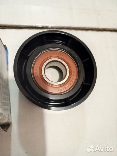 Nissan Ролик обводной 1192500Q0J