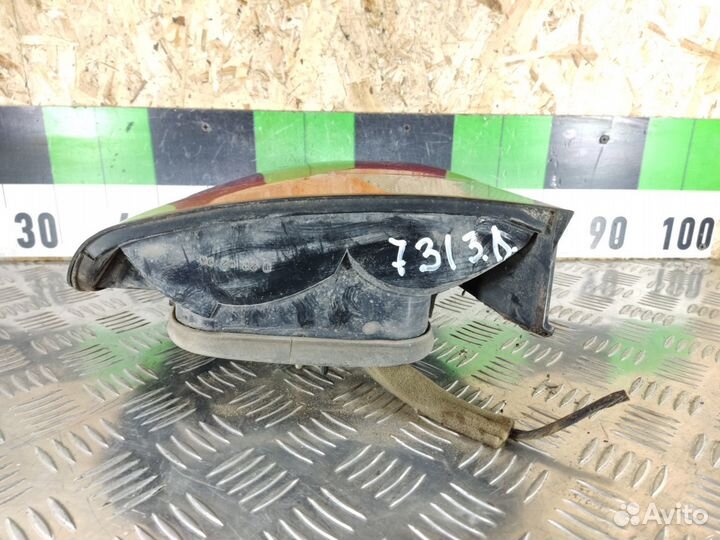 Фонарь задний левый Mitsubishi Carisma 2000 2003