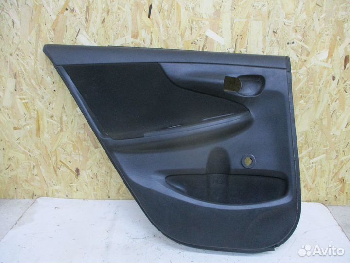 Обшивка двери Тойота Королла 150