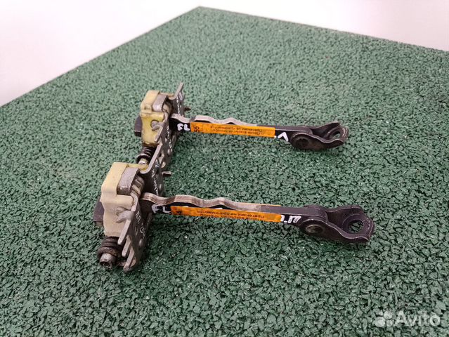 Ограничитель передней двери Renault Fluence