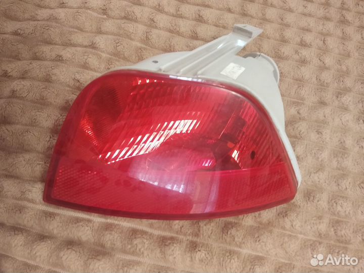 Задний противотуманный фонарь Форд Фокус-2