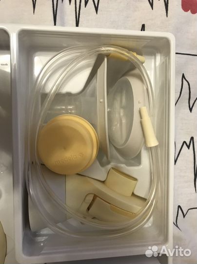 Молокоотсос medela электрический