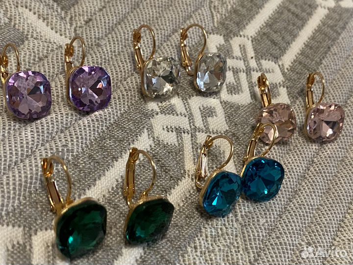 Красивые серьги много