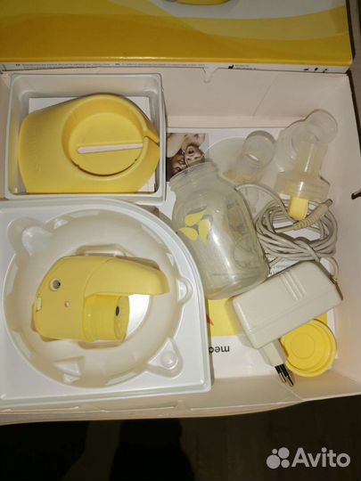 Молокоотсос medela mini electric