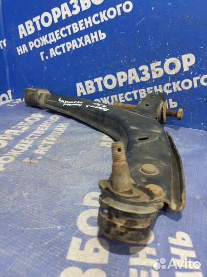 Передний правый рычаг Daewoo Nexia седан 2006