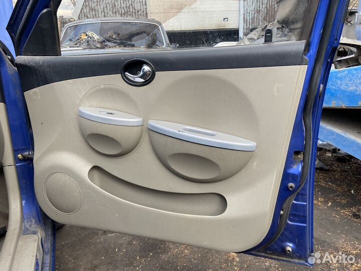 Обшивка двери Lifan Smily