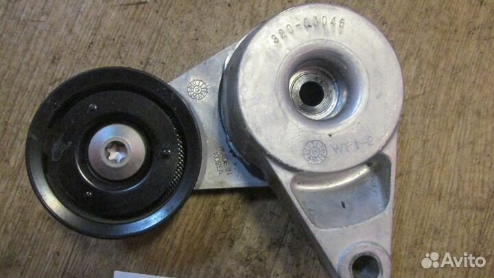 Натяжитель ремня грм (Kia Sportage)