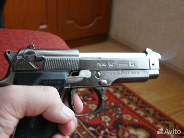 Сувенирный револьвер - зажигалка 