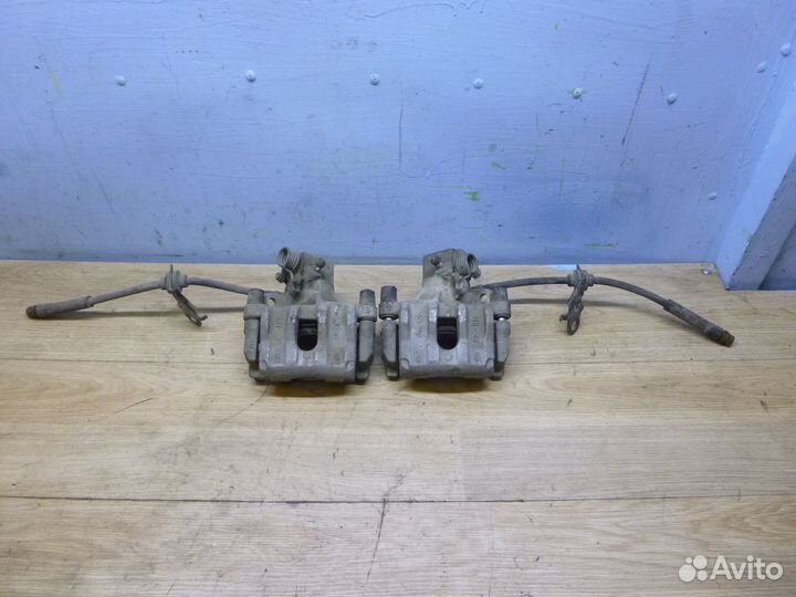 Суппорт задний левый,правый Mazda 3 (BK) 2002-2009