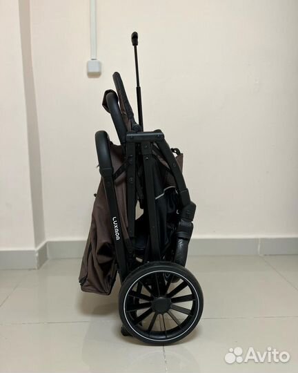 Коляска с перекидной ручкой Люксмом