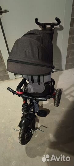 Трехколесный велосипед с ручкой